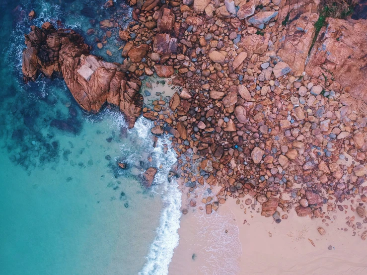 a rocky shore and a body of water