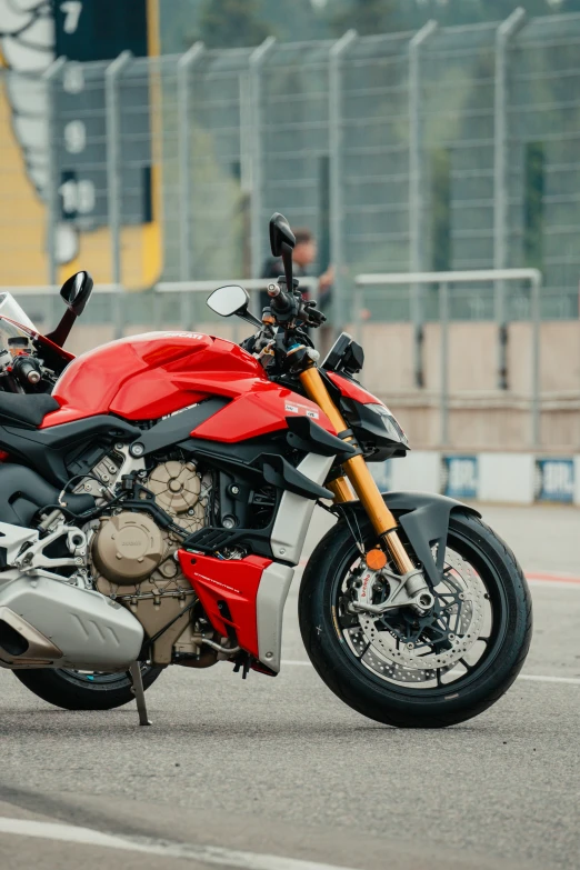 a motorcycle parked next to some people