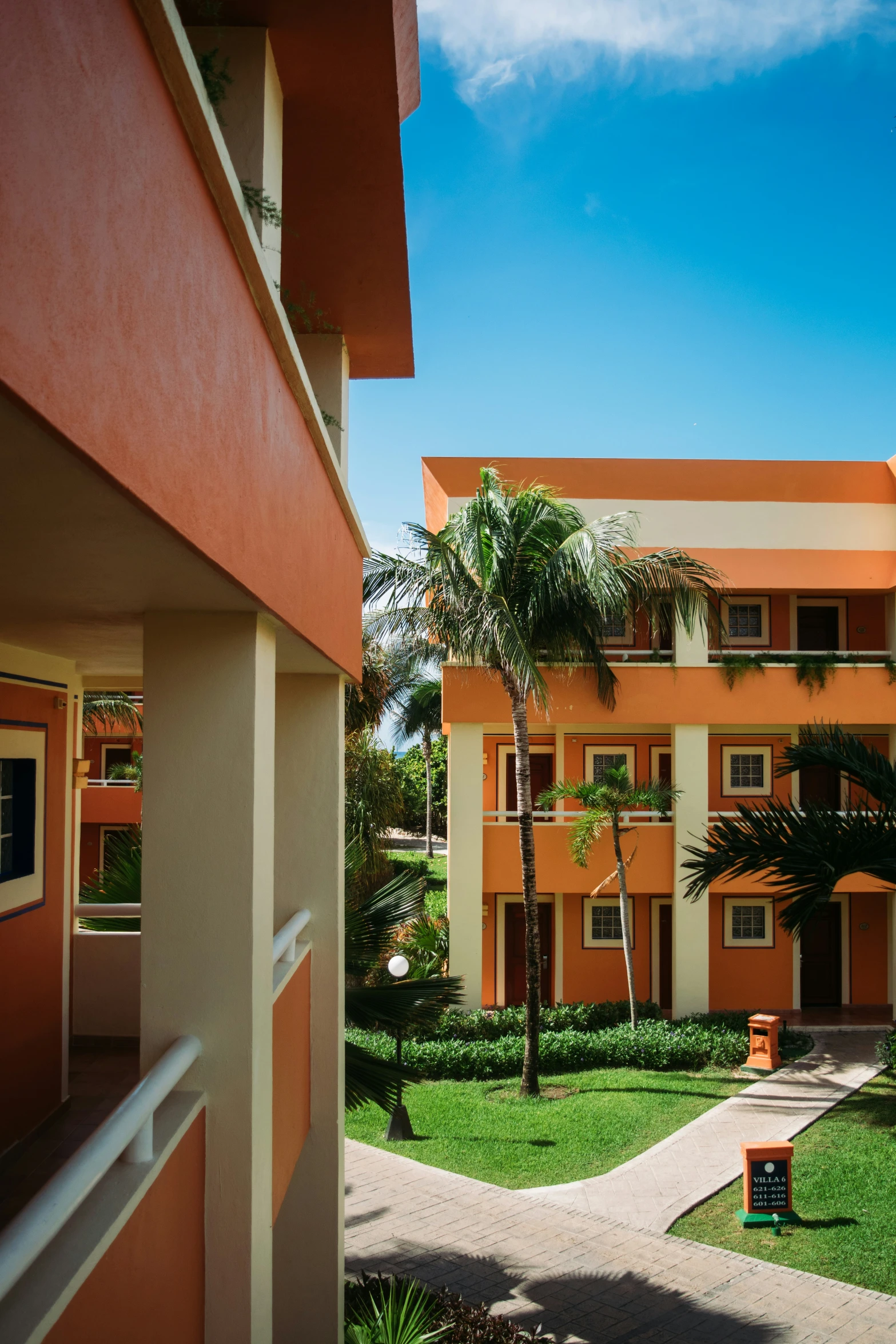 a view from inside of a building of another apartment complex