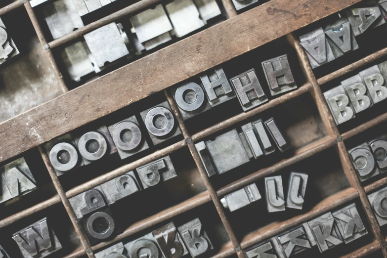 a wooden type with various different letters inside