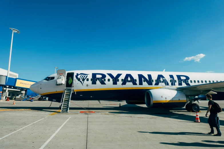 a large jetliner sitting on top of an airport tarmac