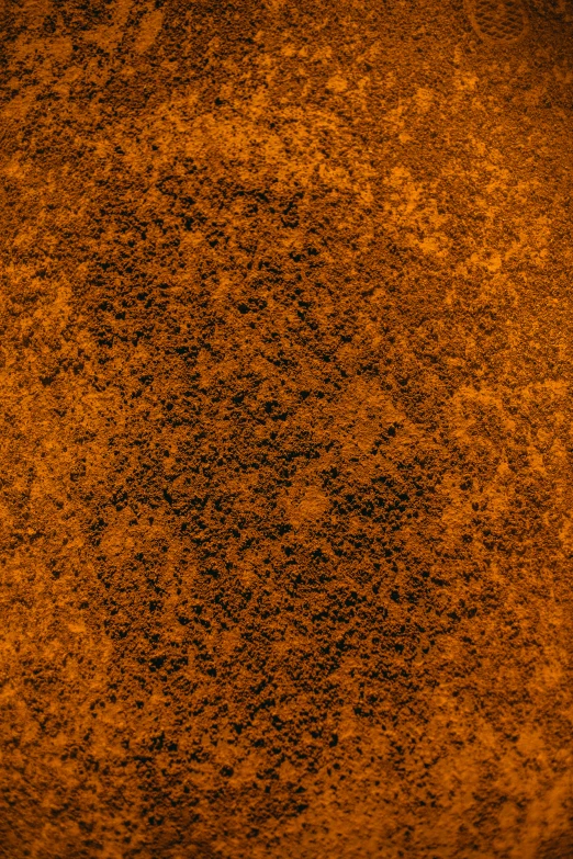 a close up po of orange colored paint