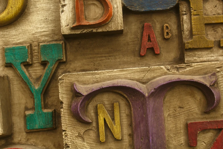 wooden letter and number made out of various types of wood letters