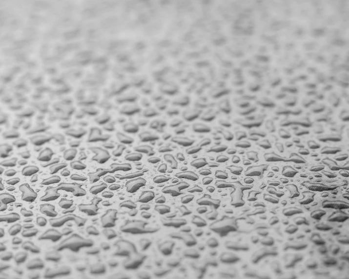 close up po of water drops on a sheet
