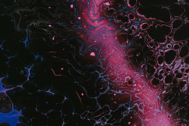 some dark blue and red colors in the center of some bubbles