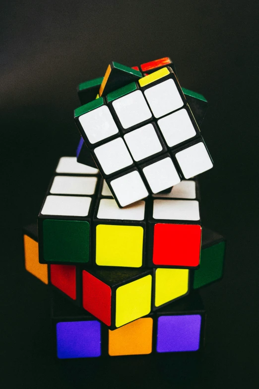 a rubik with multiple squares of multicolored materials