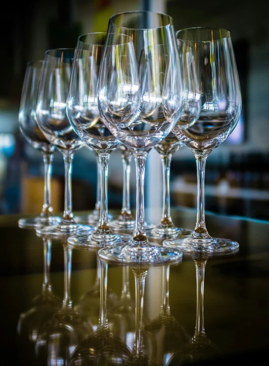 a close up view of empty wine glasses