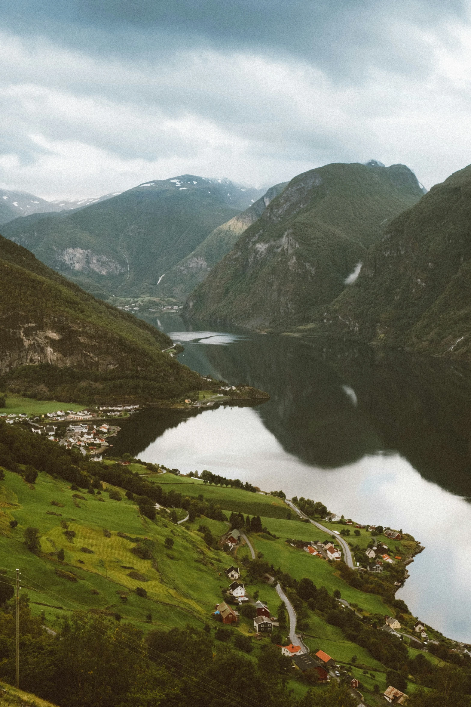 a large body of water surrounded by mountains