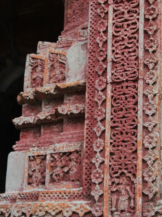 a picture of some red bricks in the side of a building