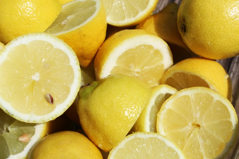 several lemons with their slices cut into smaller pieces