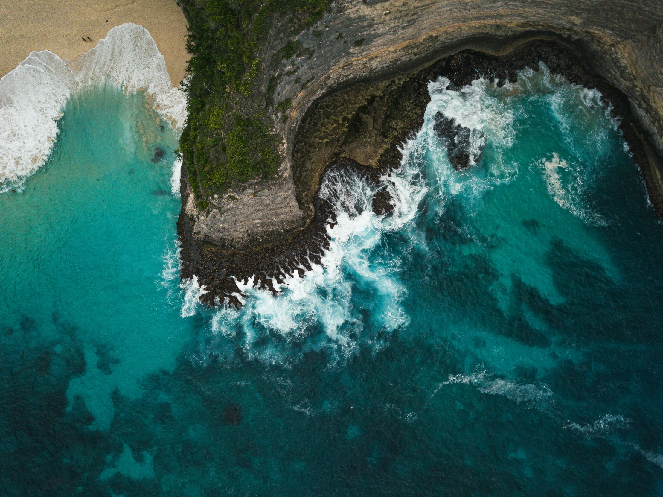 an ocean view from a helicopter shows the cliffs and ocean