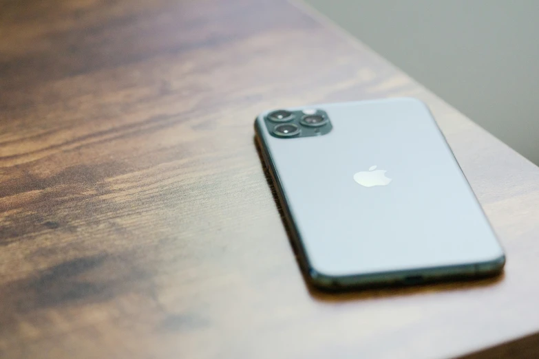 an iphone that has been placed on a table