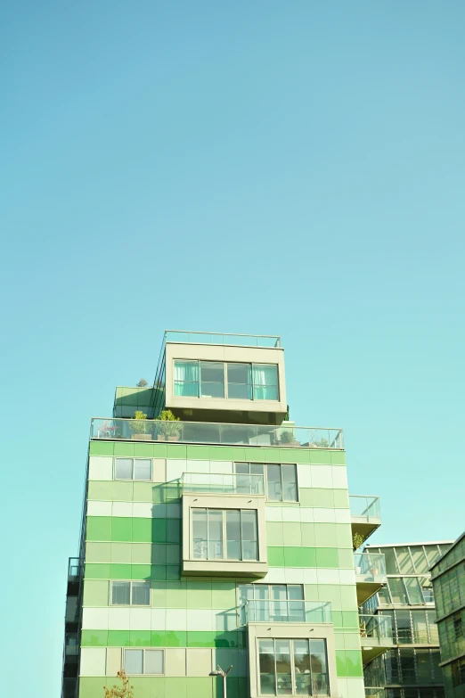 an apartment building with balconies on each floor