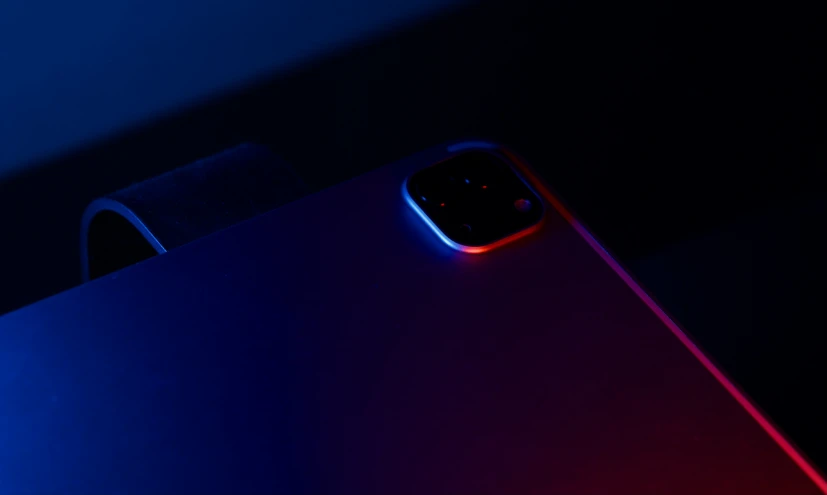 an external camera with red, blue and pink highlights