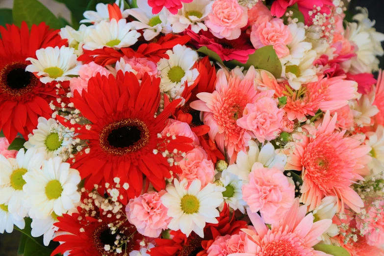 a big bouquet of flowers with various colors