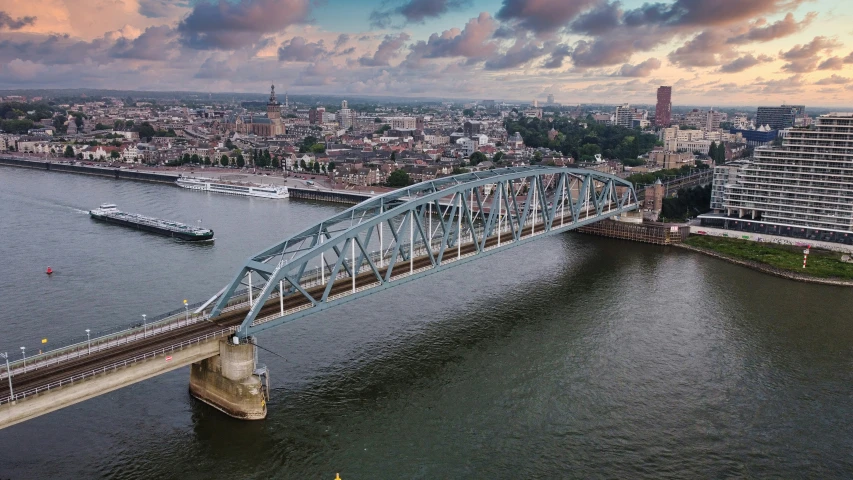 a view of the city of pittsburgh and a bridge