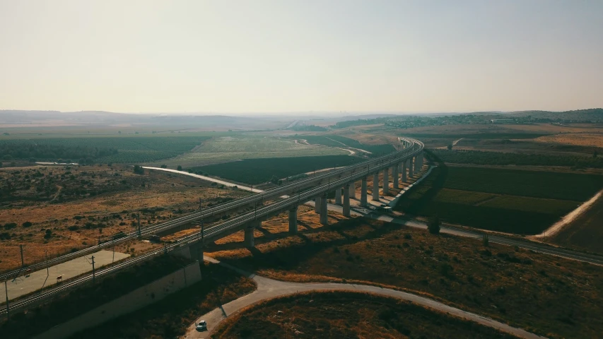 an aerial s of a bridge over a river