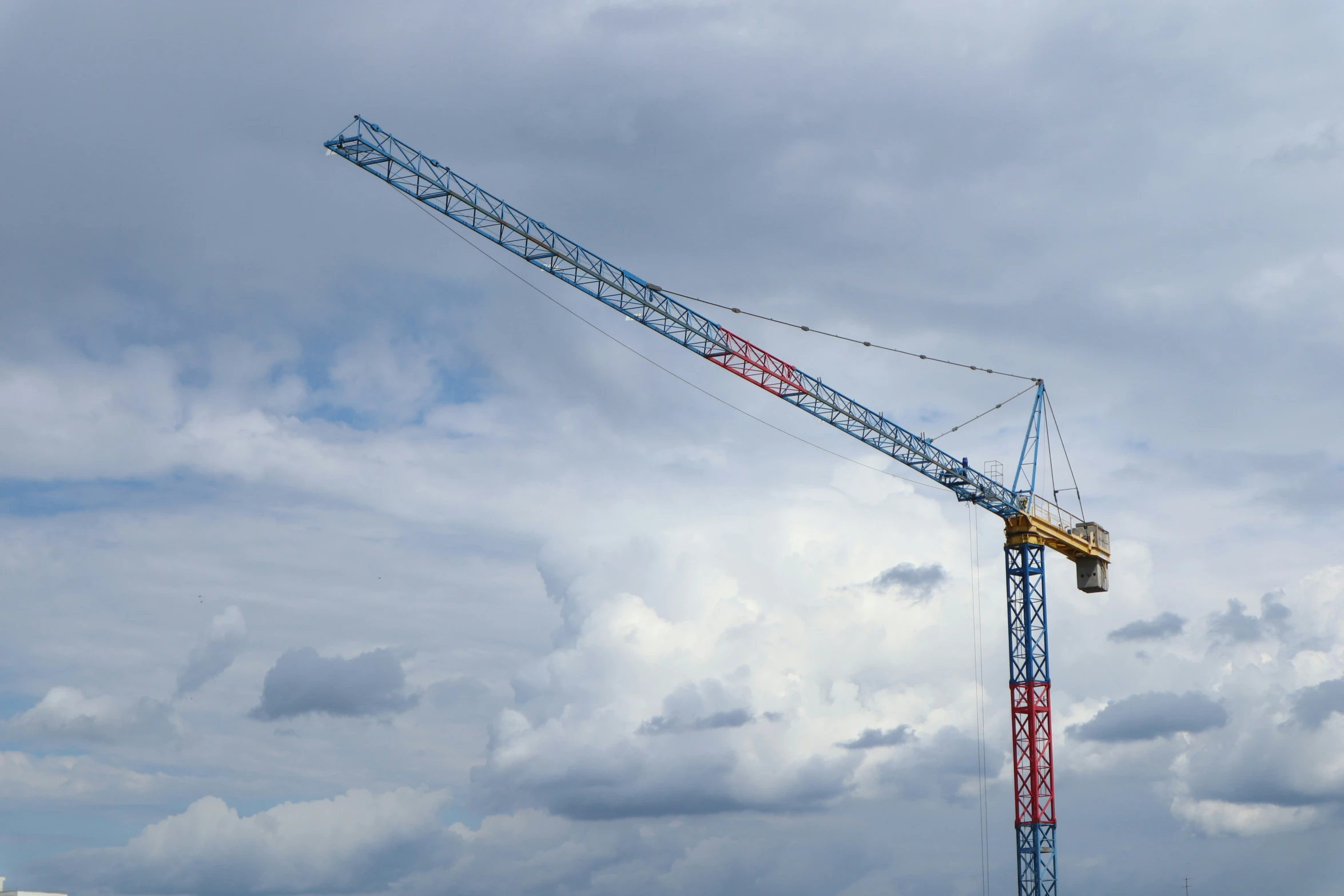 a crane that is sitting on top of some rocks