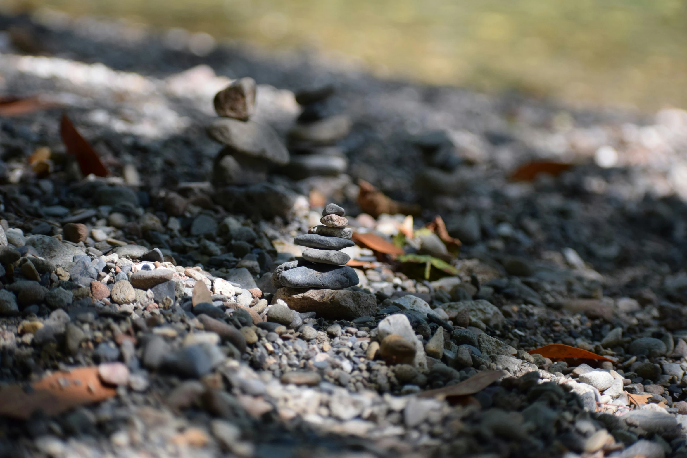 a group of rocks in the middle of the road