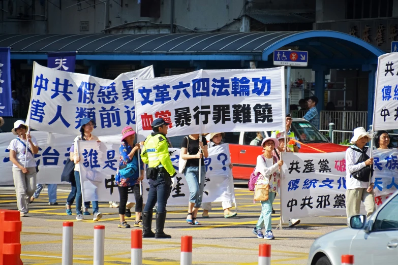 a group of protesters protesting in an asian street
