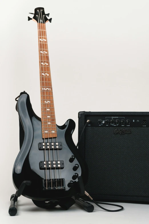 an electric guitar and amp set in front of a white background