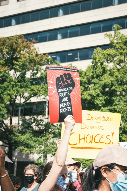 the crowd is outside protesting for the same right - wing government