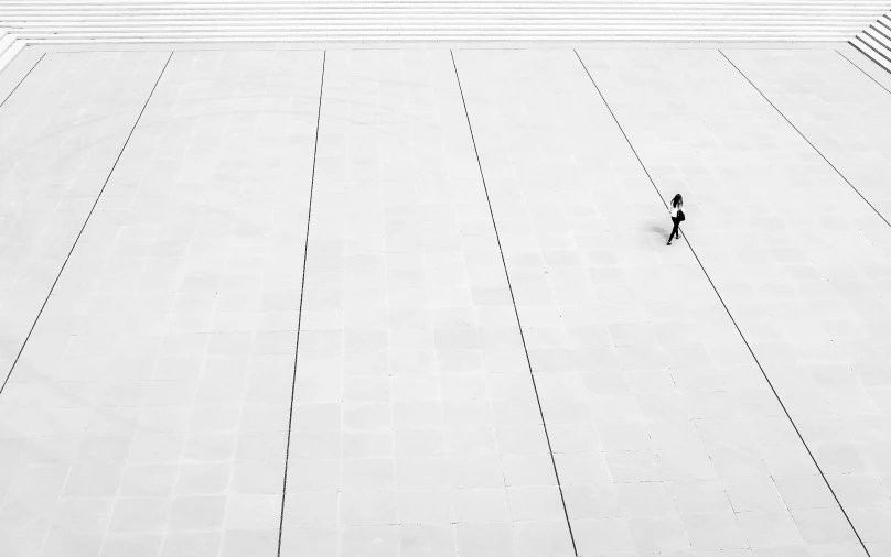 person walking on a roof with no sheets