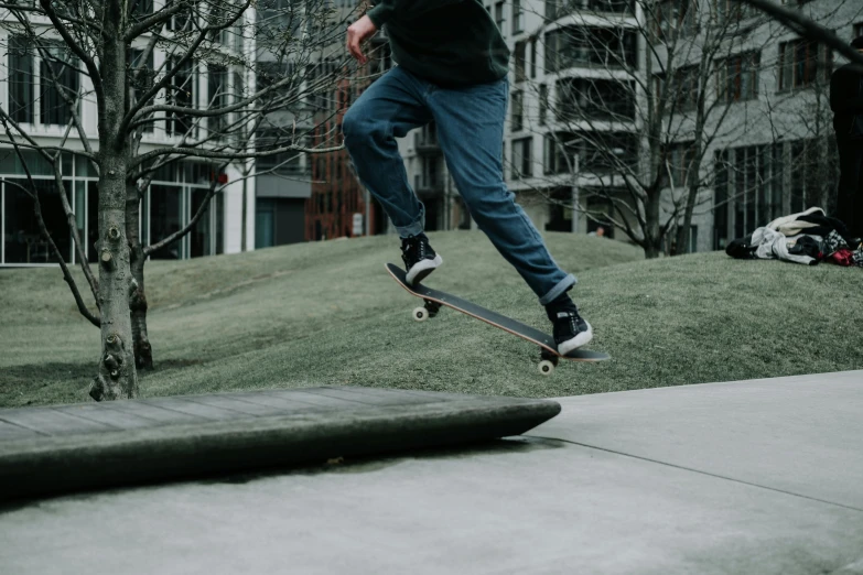 a person on a skateboard is in mid air