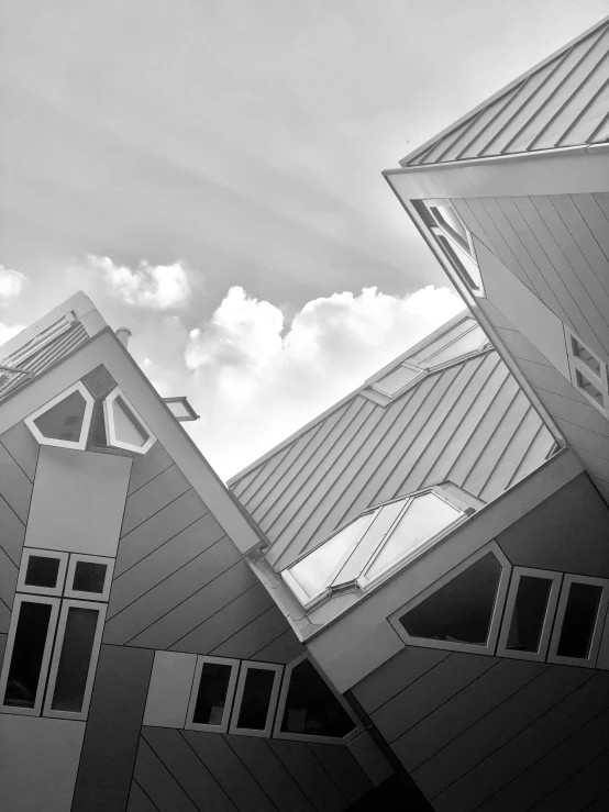 the top of some buildings on a cloudy day