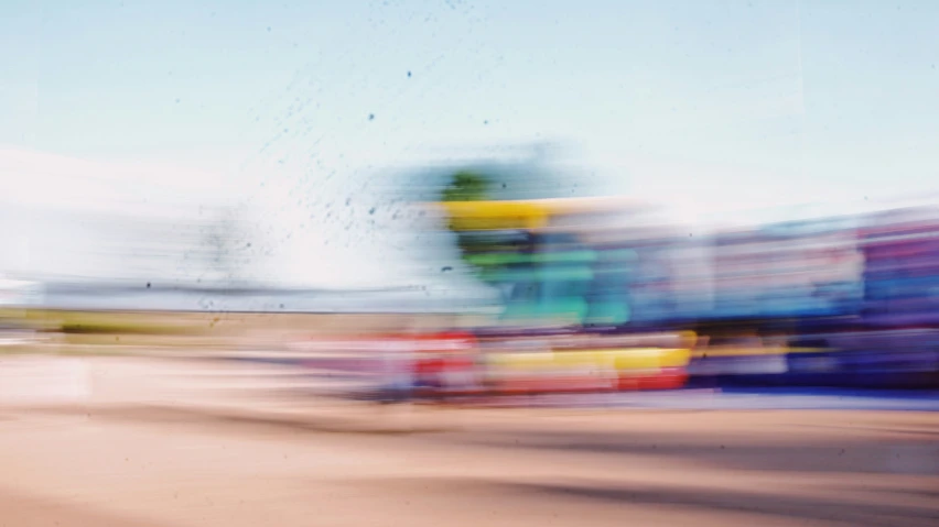 a large truck in motion as it is driving