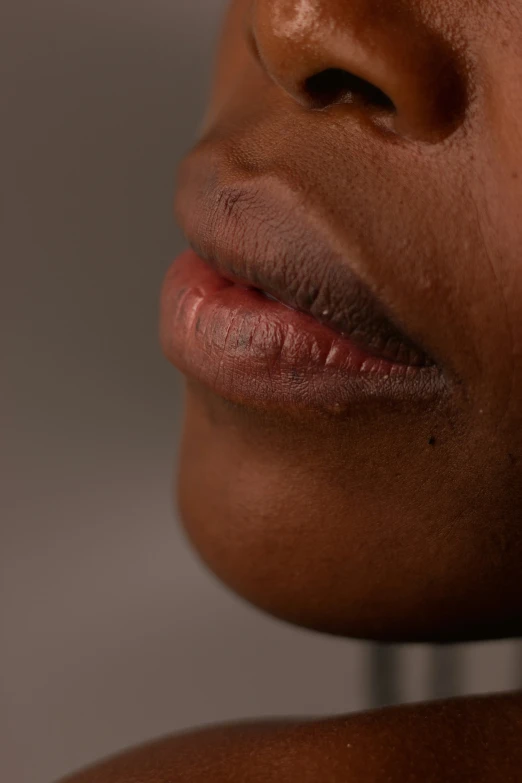 a woman looking up with her head turned to the side