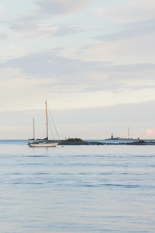 an empty sailing ship sitting on the ocean