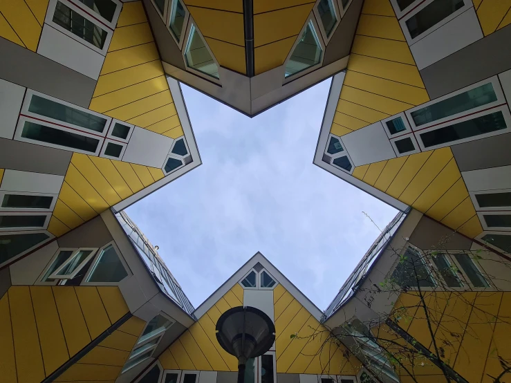 a view looking upwards from the top of a tall building