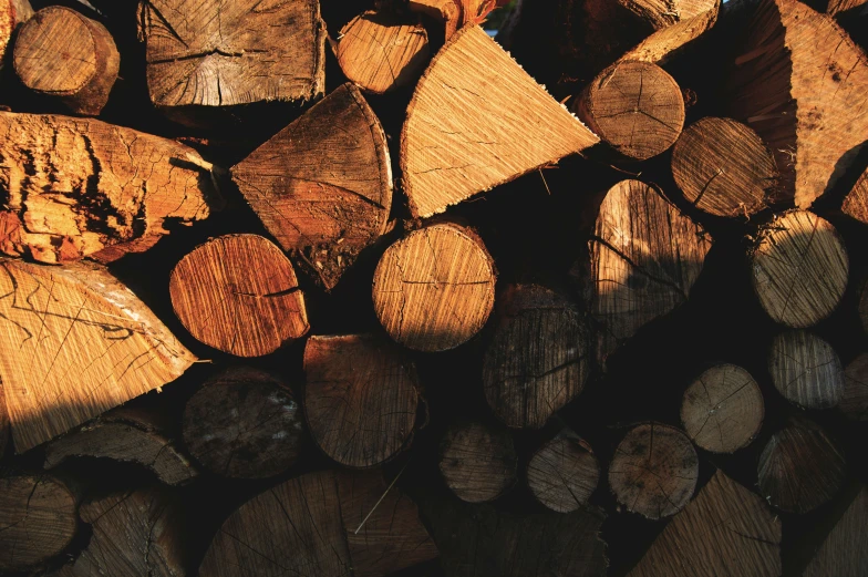 a stack of logs is sitting close together