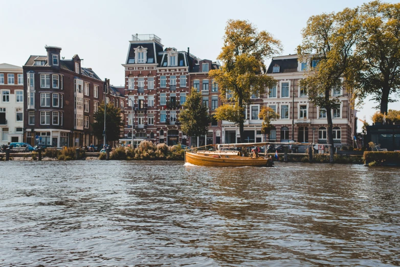 a house with many windows is on the water