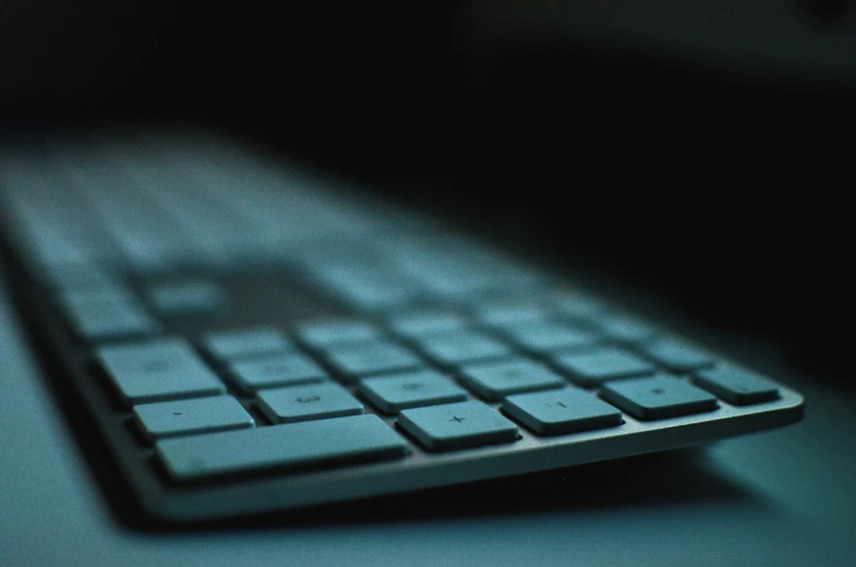 a close up po of a keyboard on a table