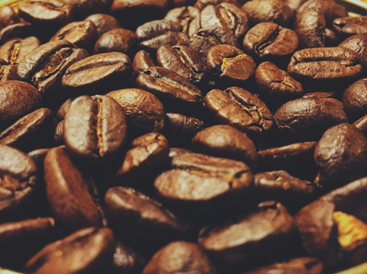 a close up of some coffee beans