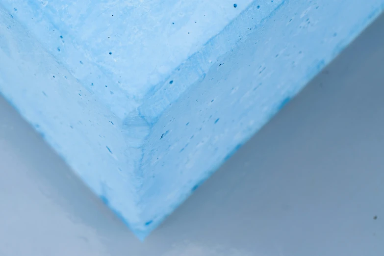 two layers of blue sponge and foam on the top