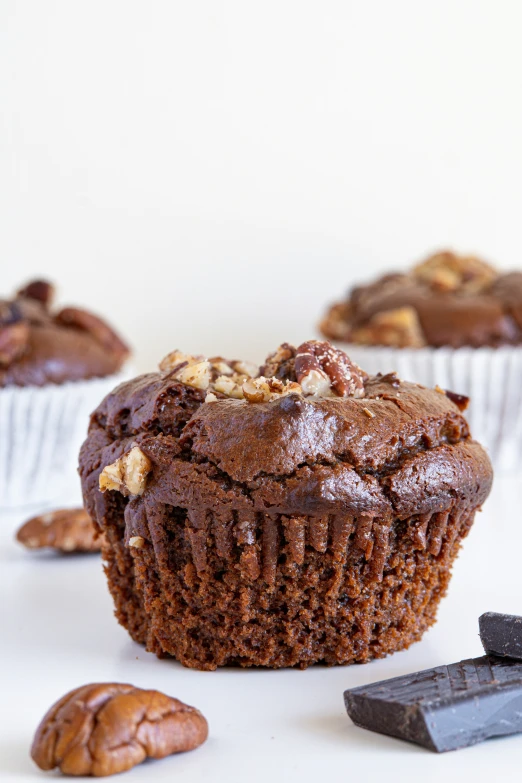 chocolate muffins and some other food items scattered around