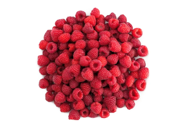 a pile of raspberries that are half eaten