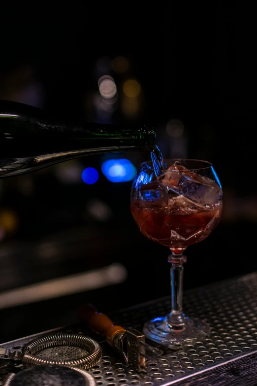 a close up of a glass with wine