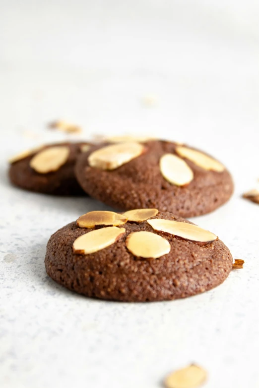 three cookies that are sitting on a table