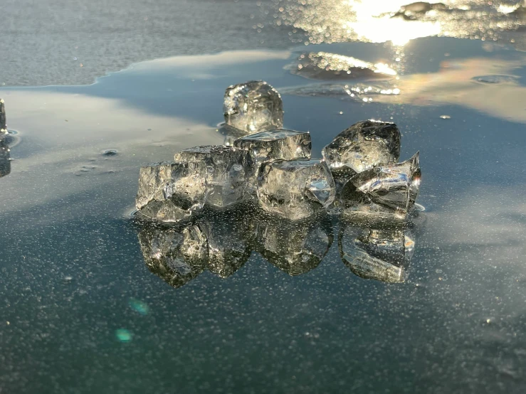 an image of ice crystals on the water