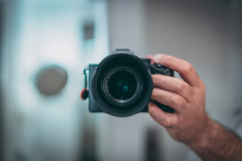 man taking a po with a digital camera