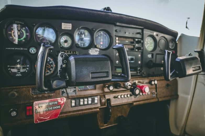 the instruments on the dashboard of a military plane