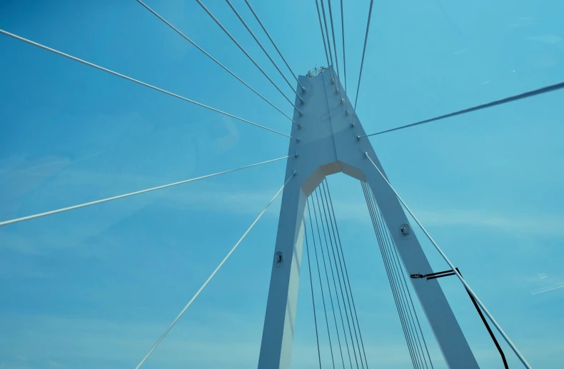 power lines hang above the tall structure