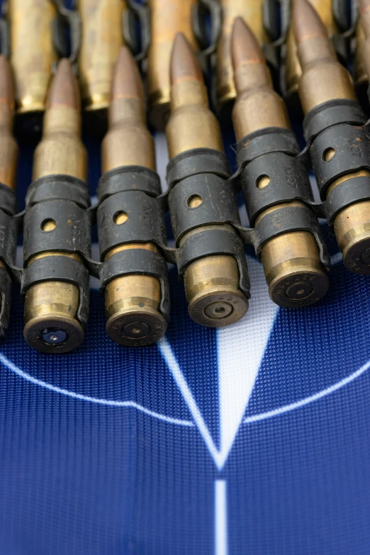 a table with a bunch of bullet laying on top of it