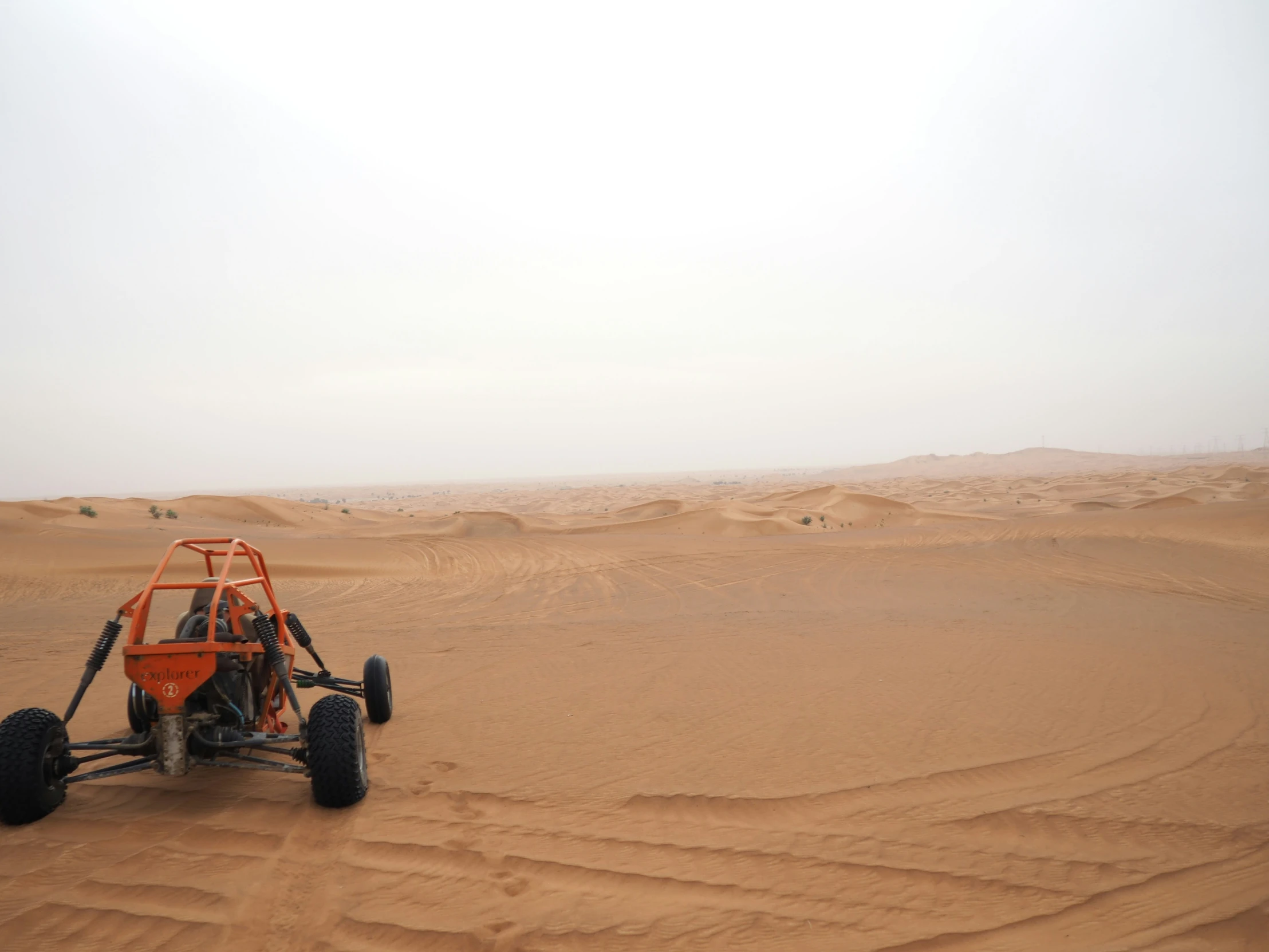 the dune buggy can be seen driving across the desert