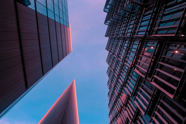 the top of a tall building next to another building