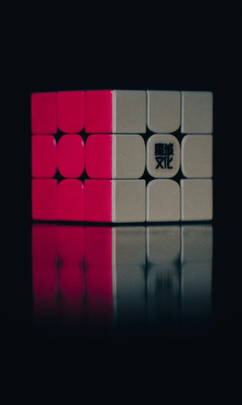 a piece of colored, white and red colored rube - off cubes